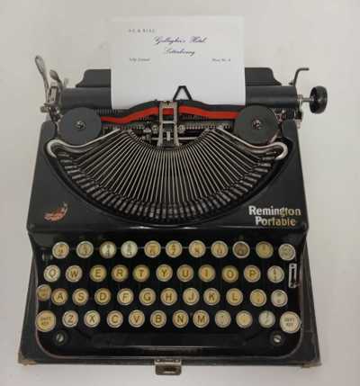 Remington Portable Typewriter in excellent condition. This typewriter was used to type up breakfast, lunch and dinner menus for Gallagher's Hotel in Letterkenny in the 1960s and 70s. Gallagher's was a popular Hotel in Letterkenny and stood on the site where Mc Gettigan's Hotel stands today. It was kindly donated to the museum collection by a member of the Glenfield family, who owned the hotel up until 1980. The donation also came with blank menu sheets. (DCM.2026.002)